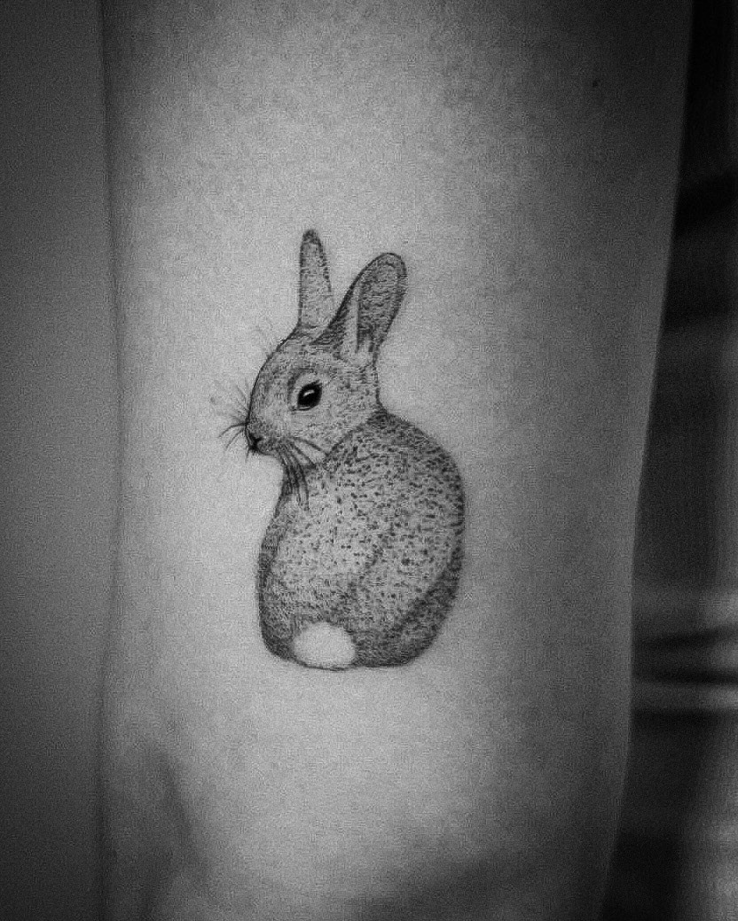 Charming black and white rabbit tattoo design Tattoo Design