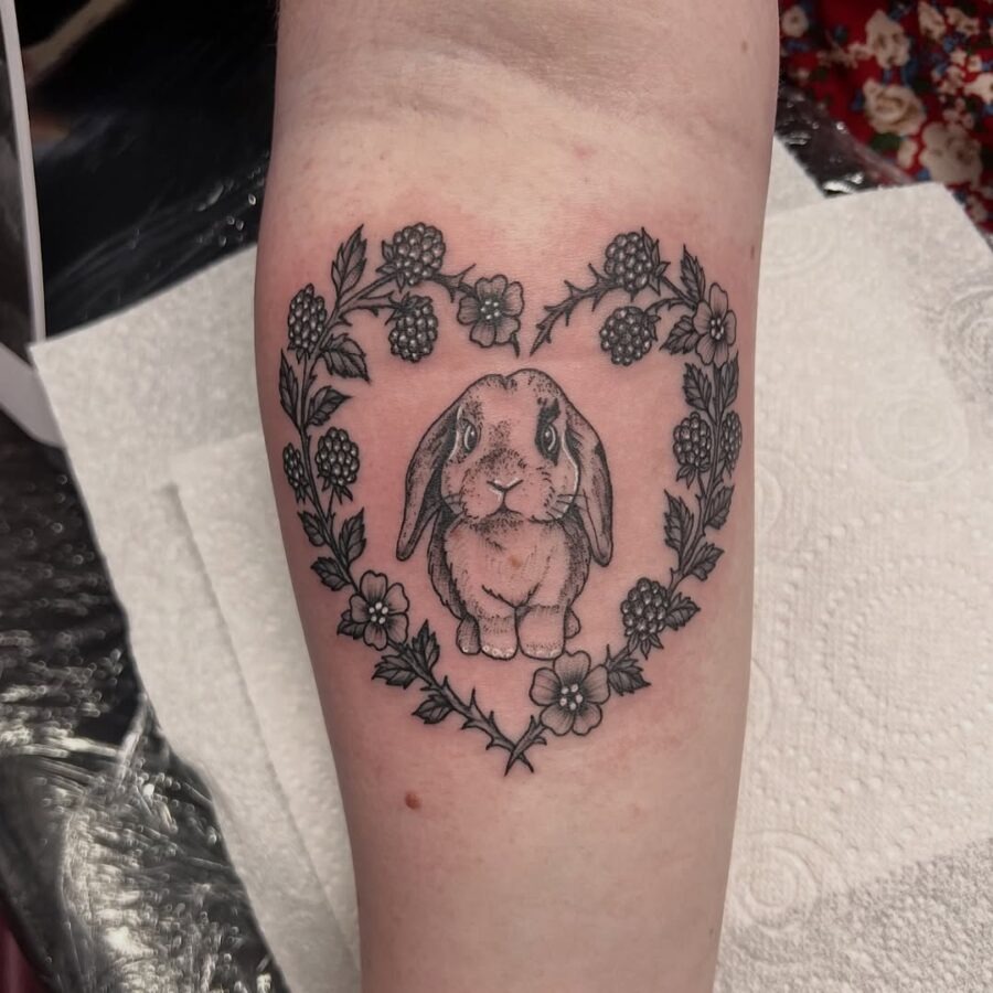 Charming heart-shaped rabbit tattoo design Tattoo Design