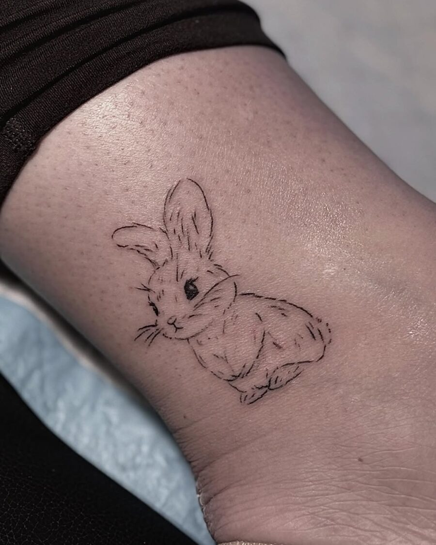 Charming minimalist rabbit tattoo design Tattoo Design