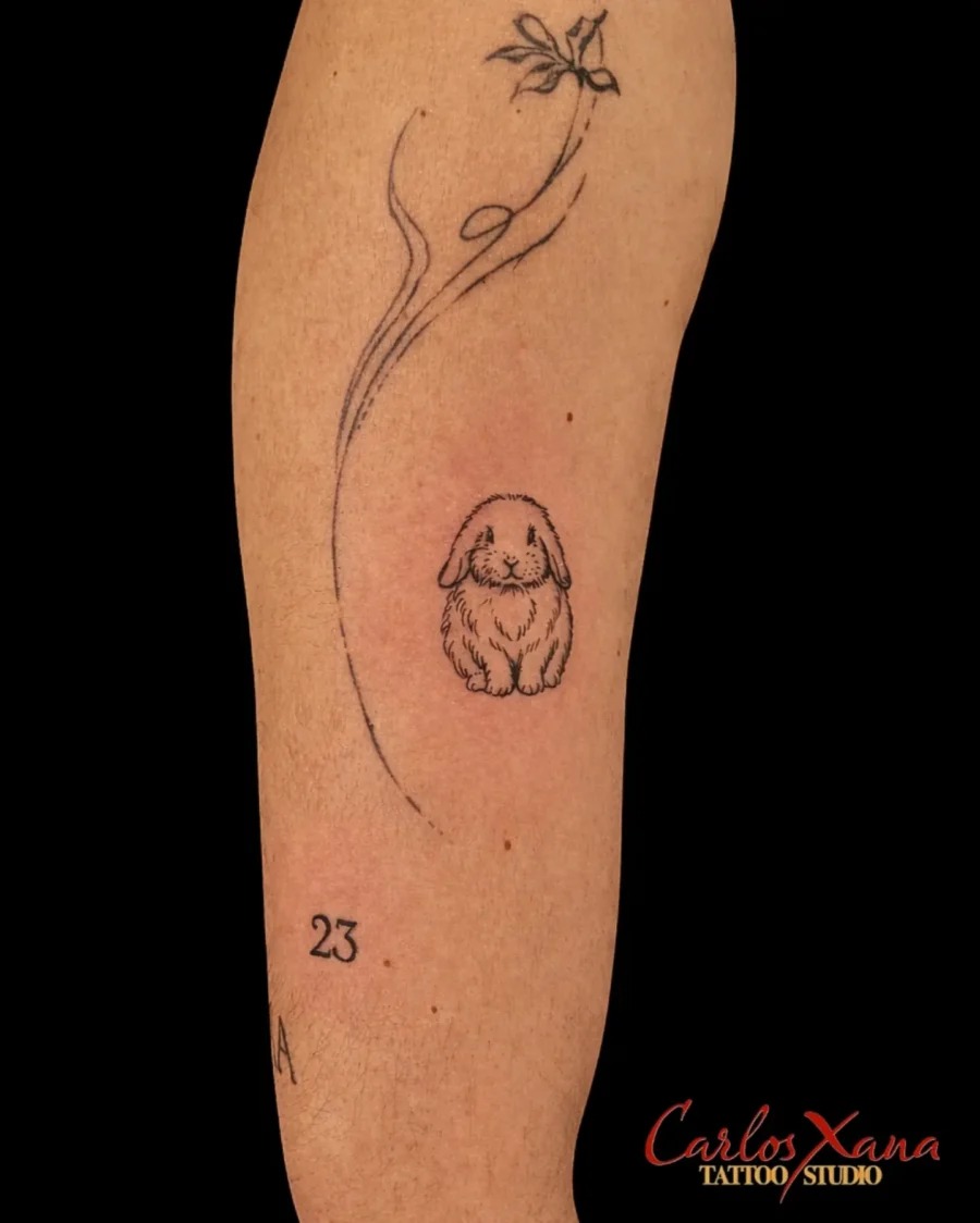 Charming minimalist rabbit tattoo for any occasion Tattoo Design