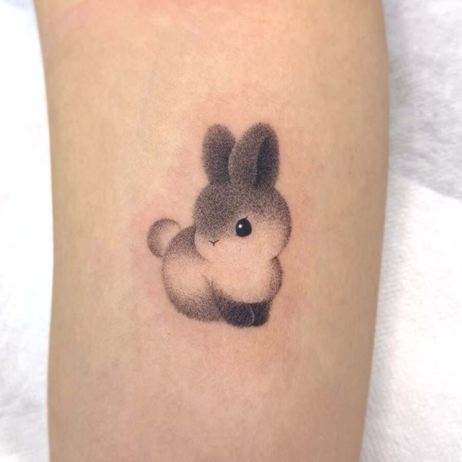Charming minimalistic rabbit tattoo design Tattoo Design