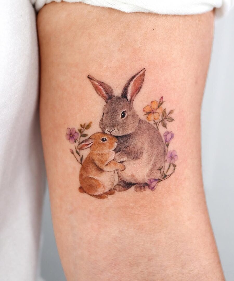 Charming mother and baby bunny tattoo design Tattoo Design