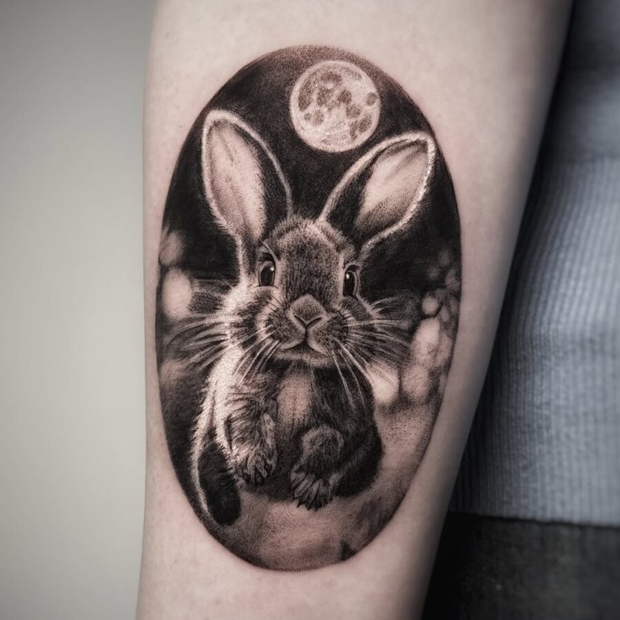 Charming Rabbit Tattoo in Moonlit Atmosphere Tattoo Design