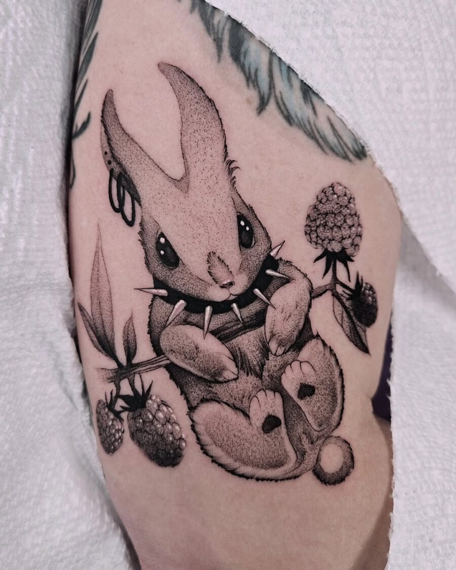 Charming Rabbit Tattoo with Floral Accents Tattoo Design