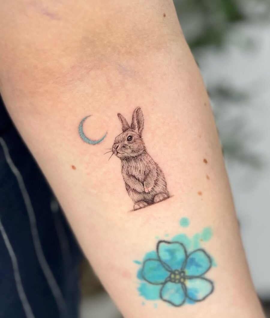 Charming rabbit tattoo with moon and flower Tattoo Design