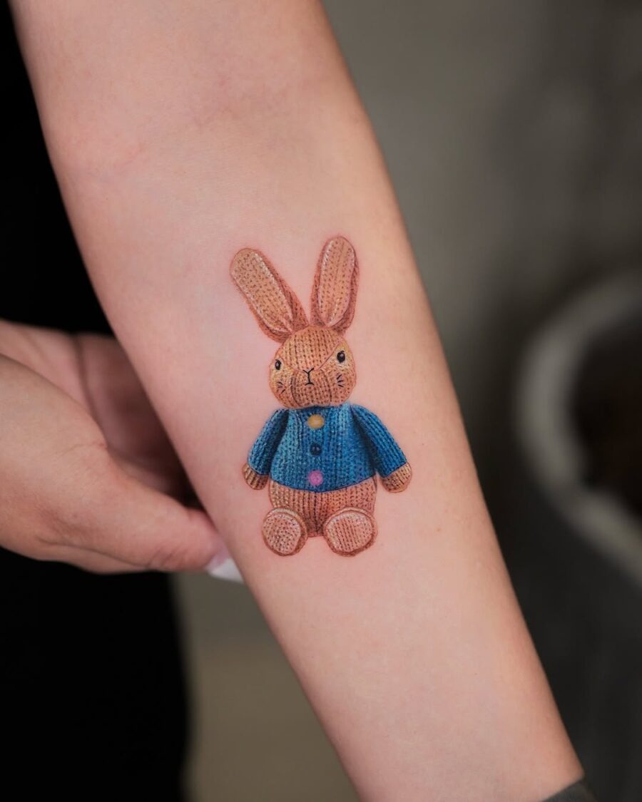 Cute rabbit tattoo with knitted texture Tattoo Design