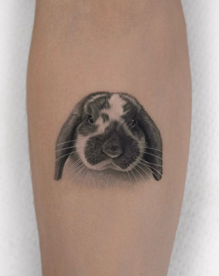 Detailed black and gray rabbit tattoo design Tattoo Design