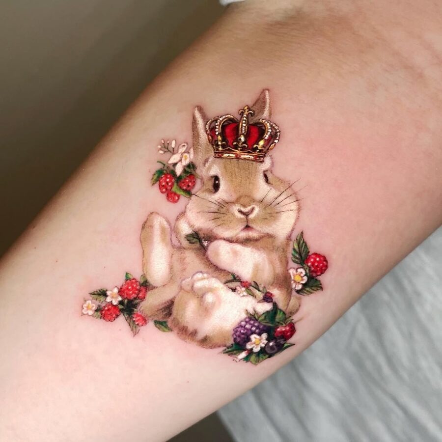 Majestic rabbit tattoo adorned with floral elements Tattoo Design