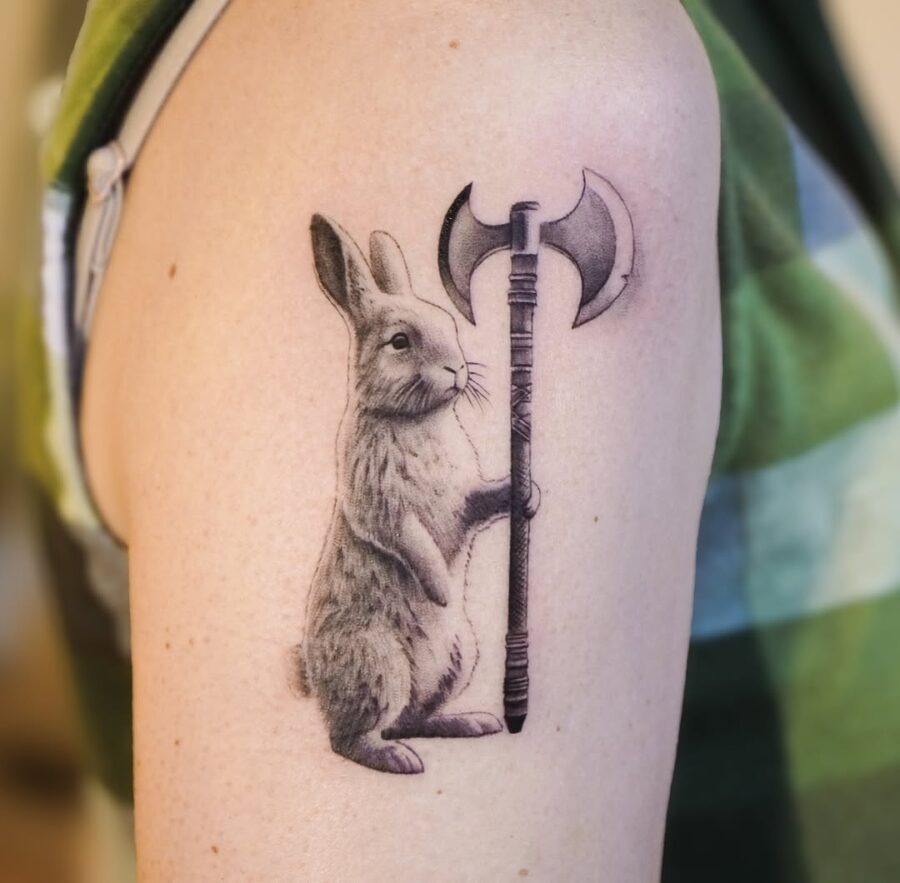 Playful yet fierce rabbit tattoo Piece Tattoo Design