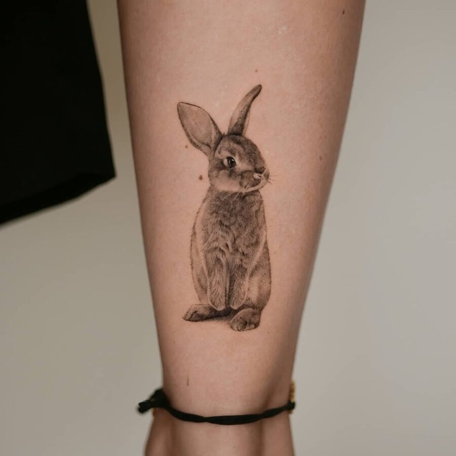 Realistic rabbit tattoo showcasing lifelike details Tattoo Design