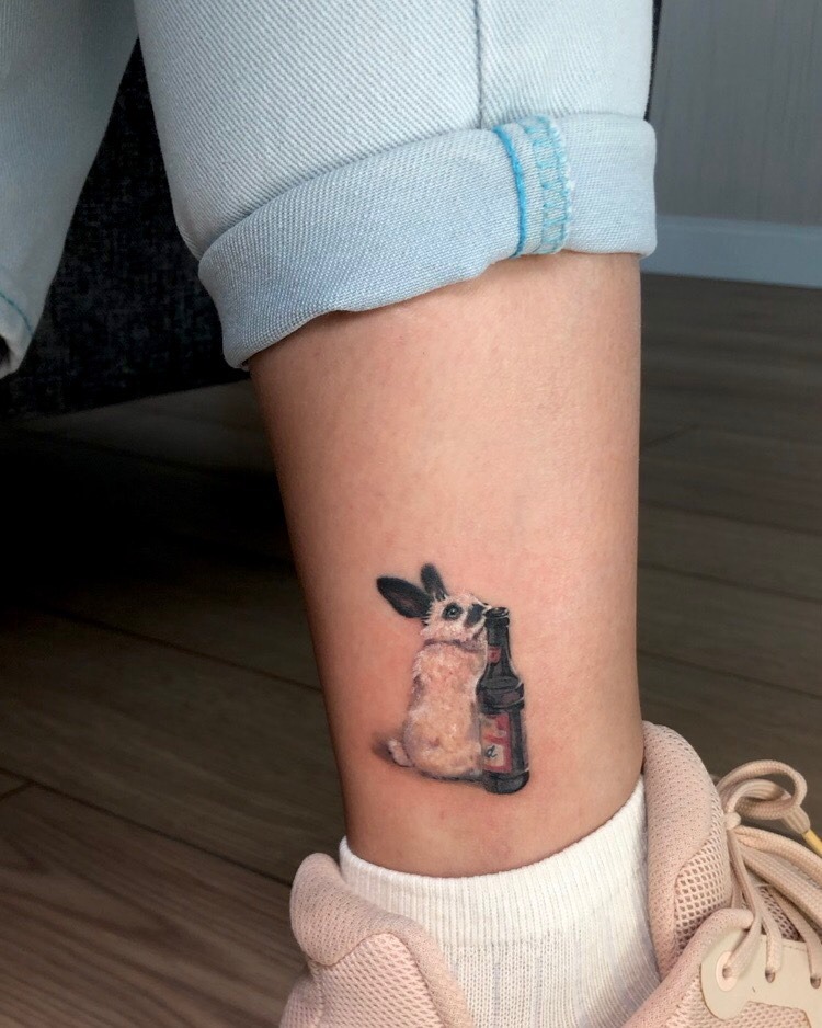 Whimsical rabbit tattoo with a playful touch Tattoo Design