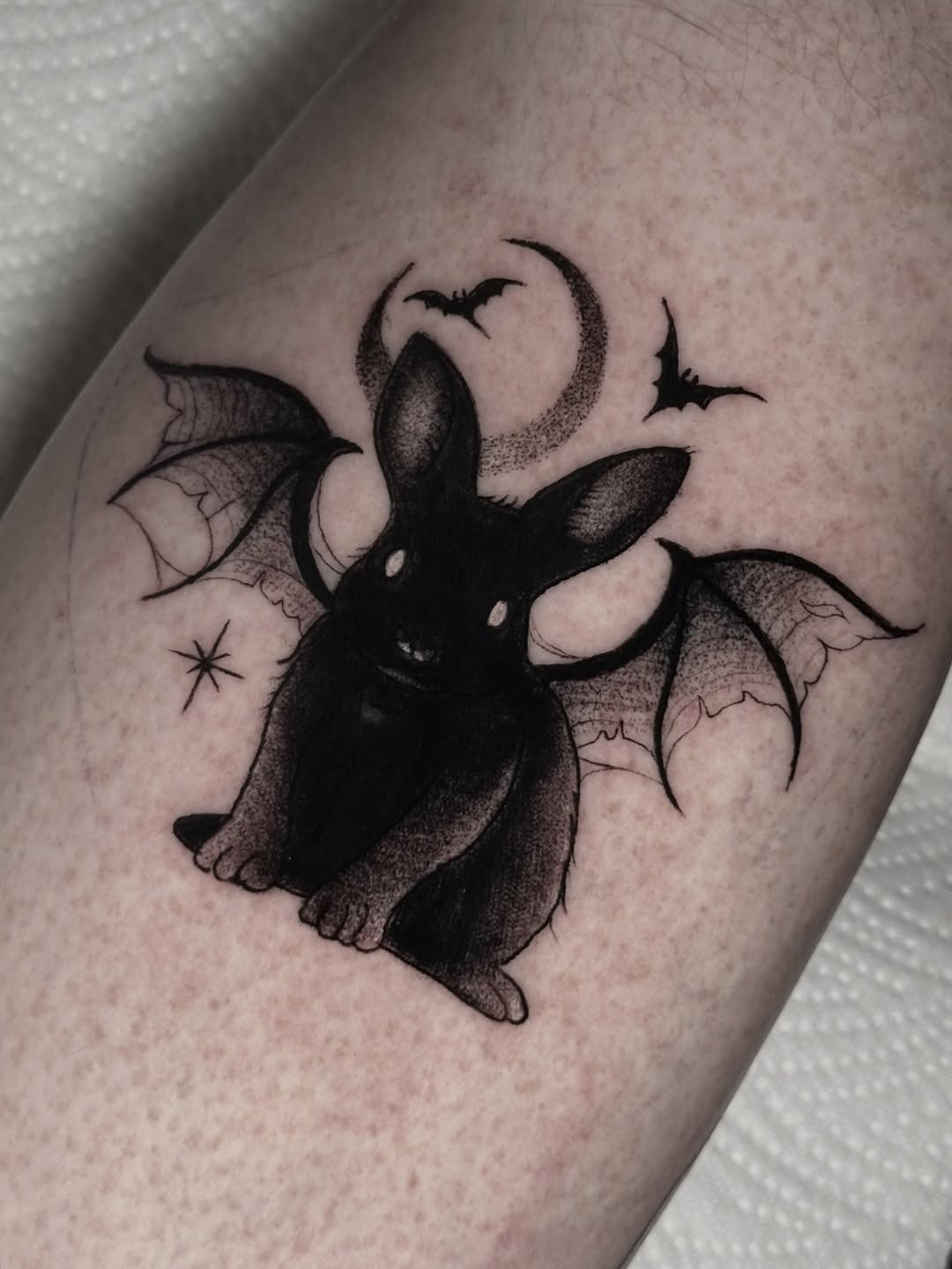 Whimsical rabbit tattoo with bat wings Tattoo Design