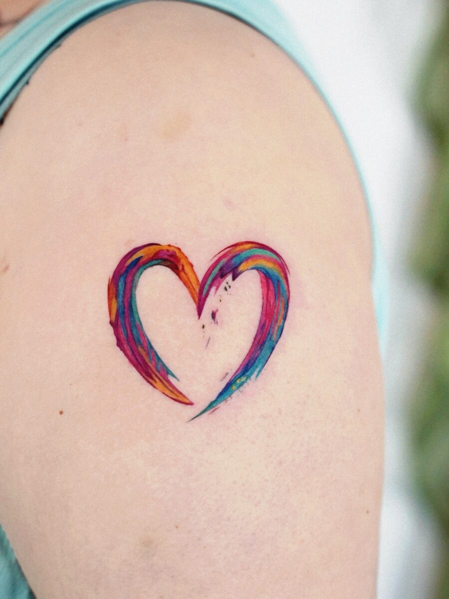 A vibrant heart tattoo celebrating rainbow babies Tattoo Design
