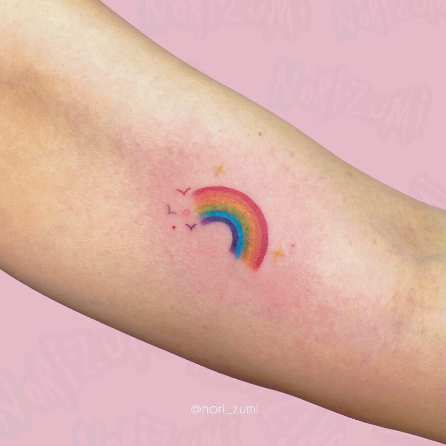 Charming rainbow tattoo celebrating new beginnings Tattoo Design