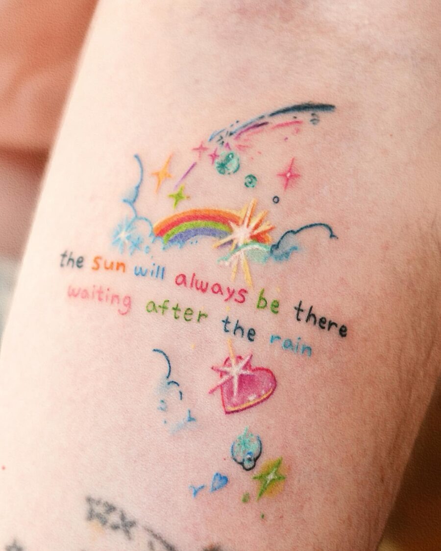 Colorful rainbow baby tattoo with a hopeful message Tattoo Design