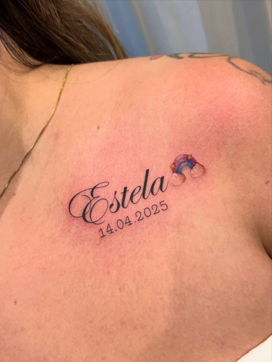 Heartfelt rainbow tattoo honoring a lost child Tattoo Design