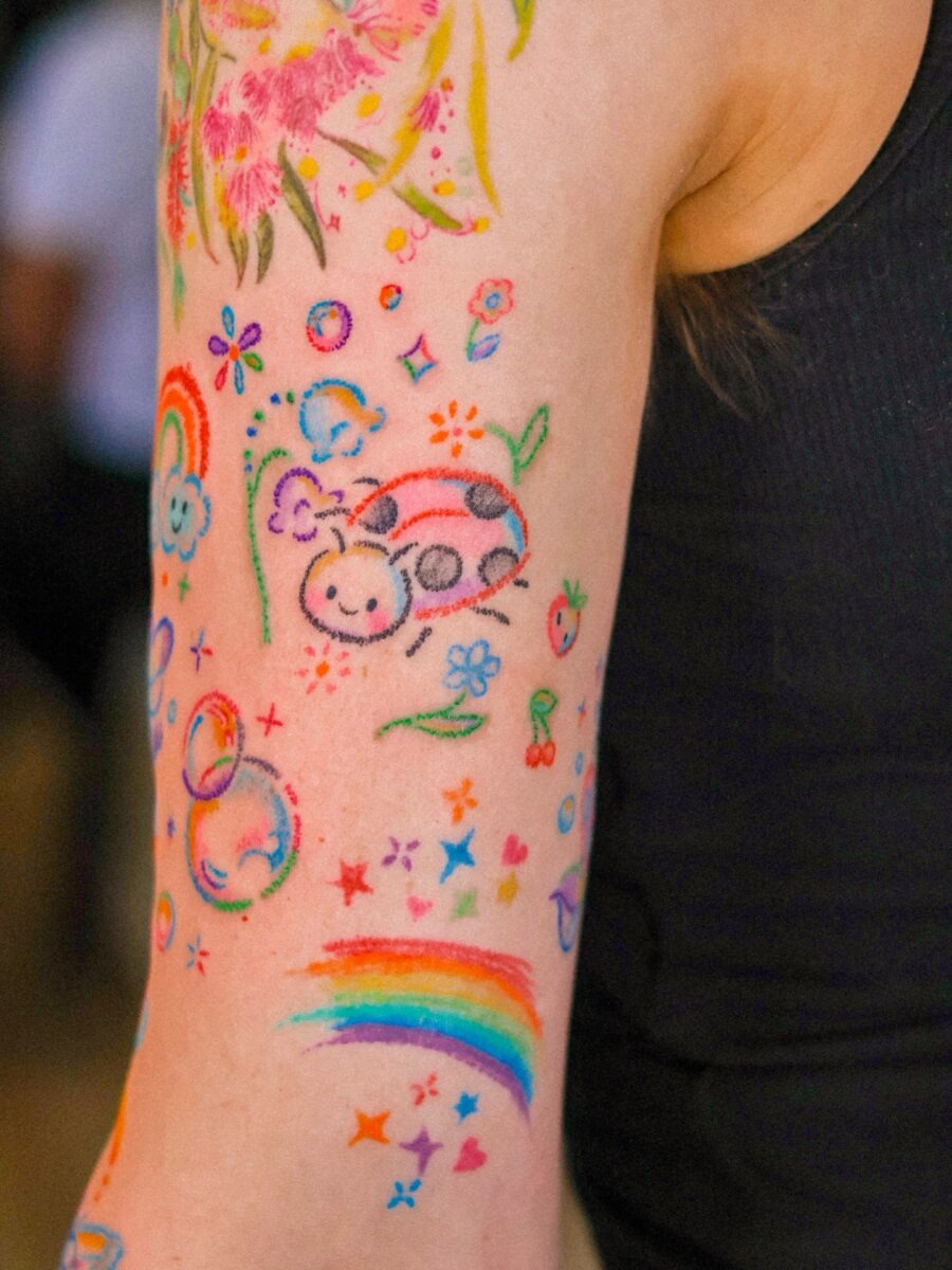 Playful and colorful rainbow baby tattoos showcased here Tattoo Design