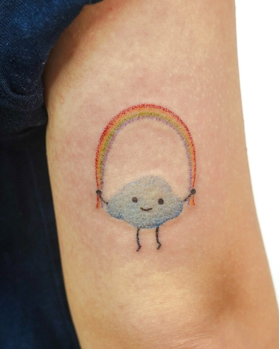 Playful cloud holding a vibrant rainbow Tattoo Design