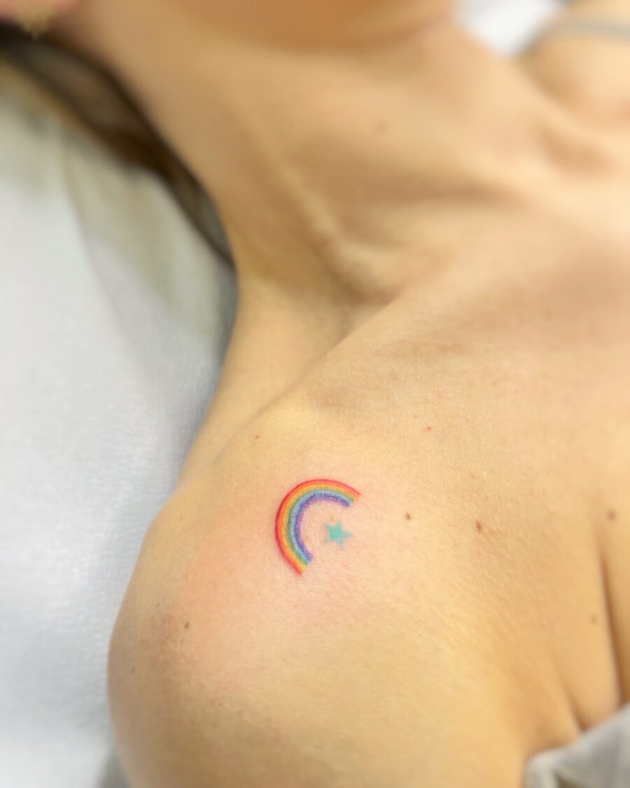 Vibrant Rainbow Baby Tattoo on Skin Tattoo Design