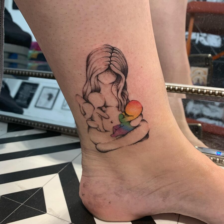 Whimsical rainbow baby tattoo design inspiration Tattoo Design