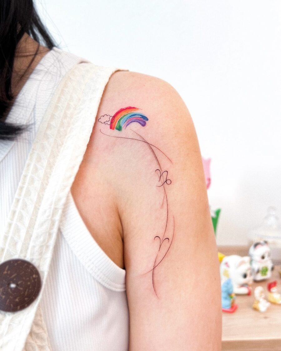 Whimsical rainbow baby tattoo featuring a girl Tattoo Design