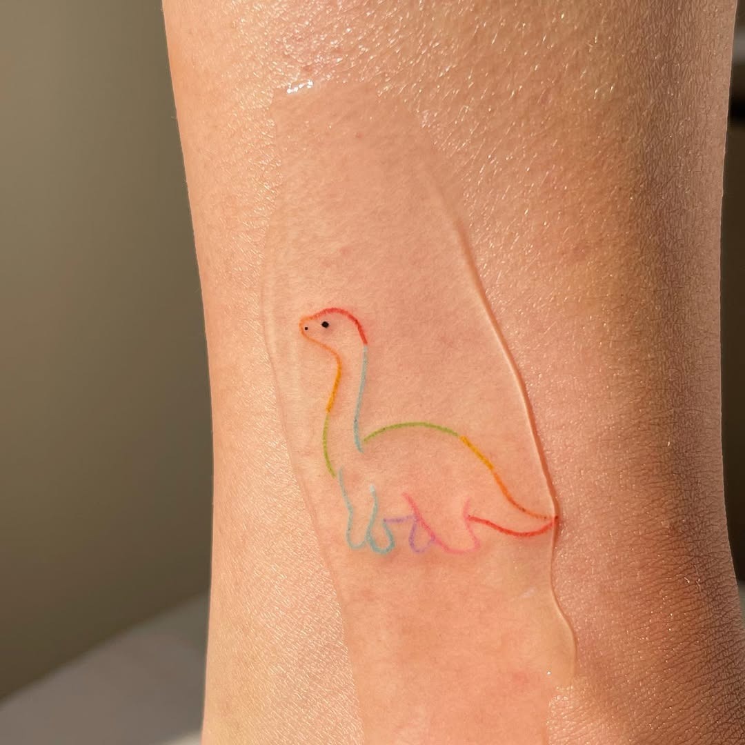Charming Rainbow Dinosaur Tattoo Inspiration Tattoo Design