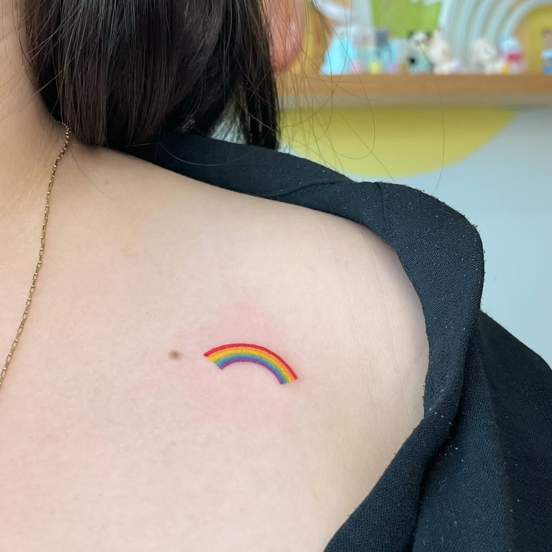 Charming Rainbow Tattoo on Shoulder Tattoo Design