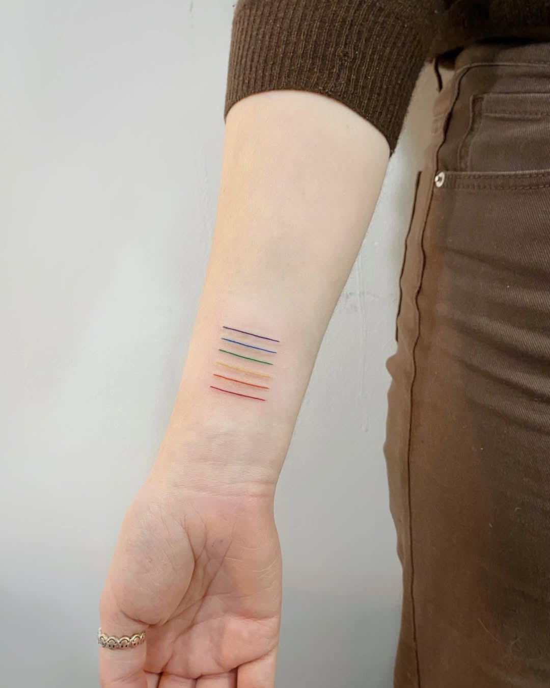 Elegant Minimalist Rainbow Line Tattoo Tattoo Design