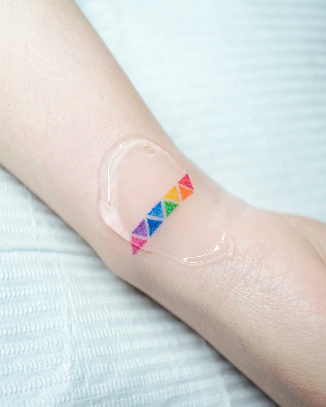 Vibrant Rainbow Tattoo Design on Skin Tattoo Design