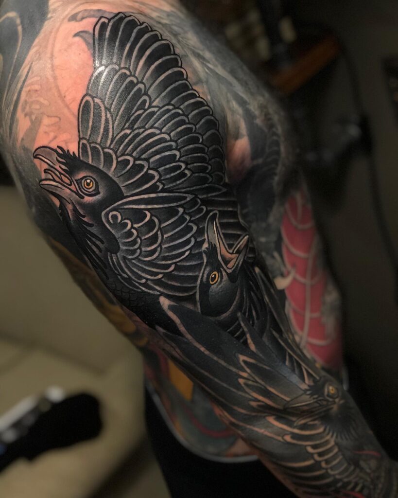 Dynamic Raven Sleeve Tattoo Design