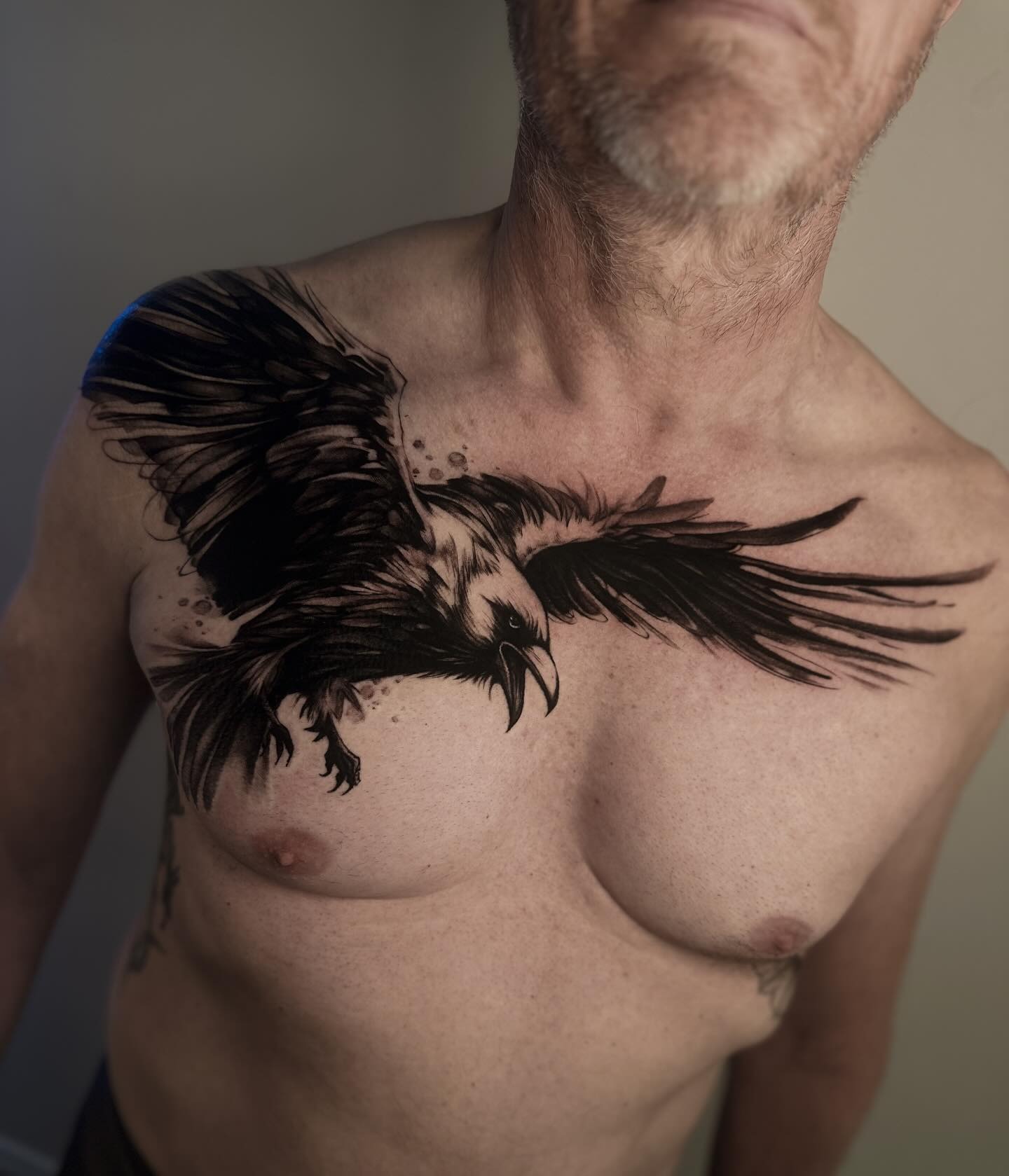 Fierce Raven Chest Tattoo Design