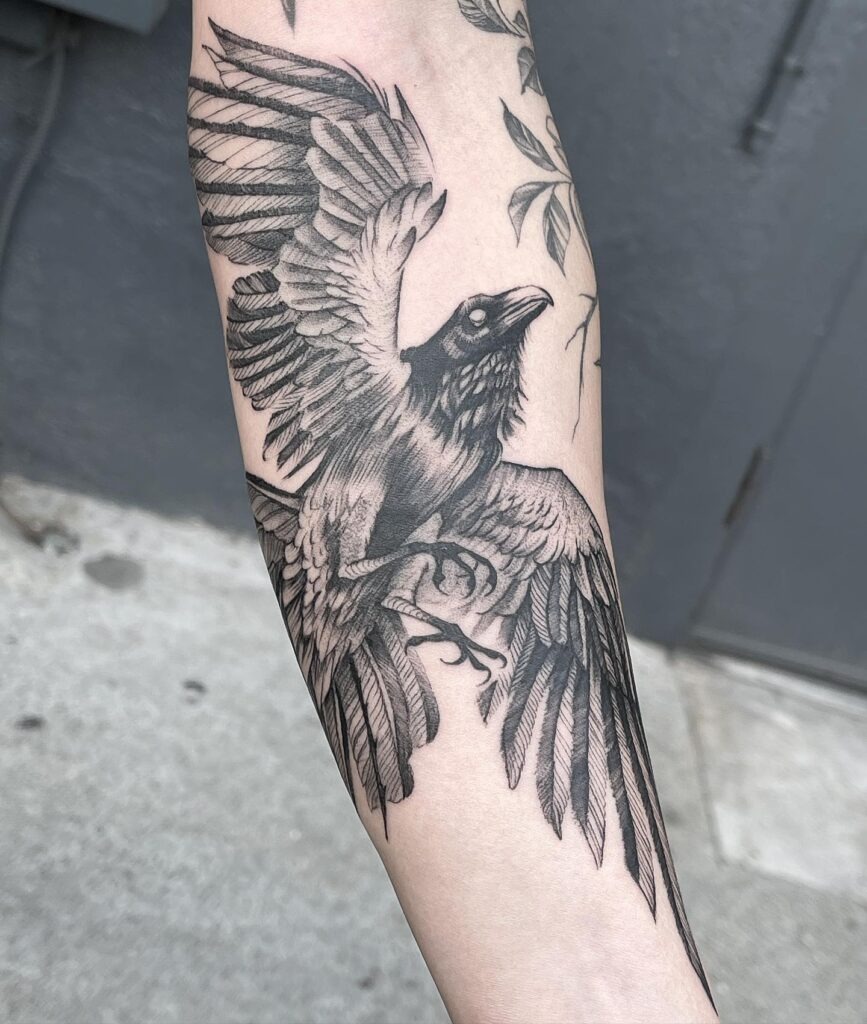 Flying Raven Forearm Tattoo Design