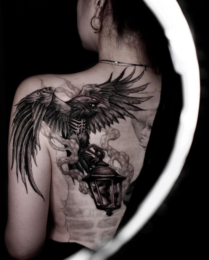 Raven and Lantern Back Tattoo Design