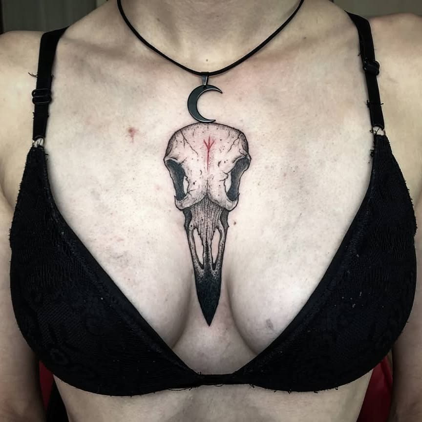 Raven Skull Sternum Tattoo Design