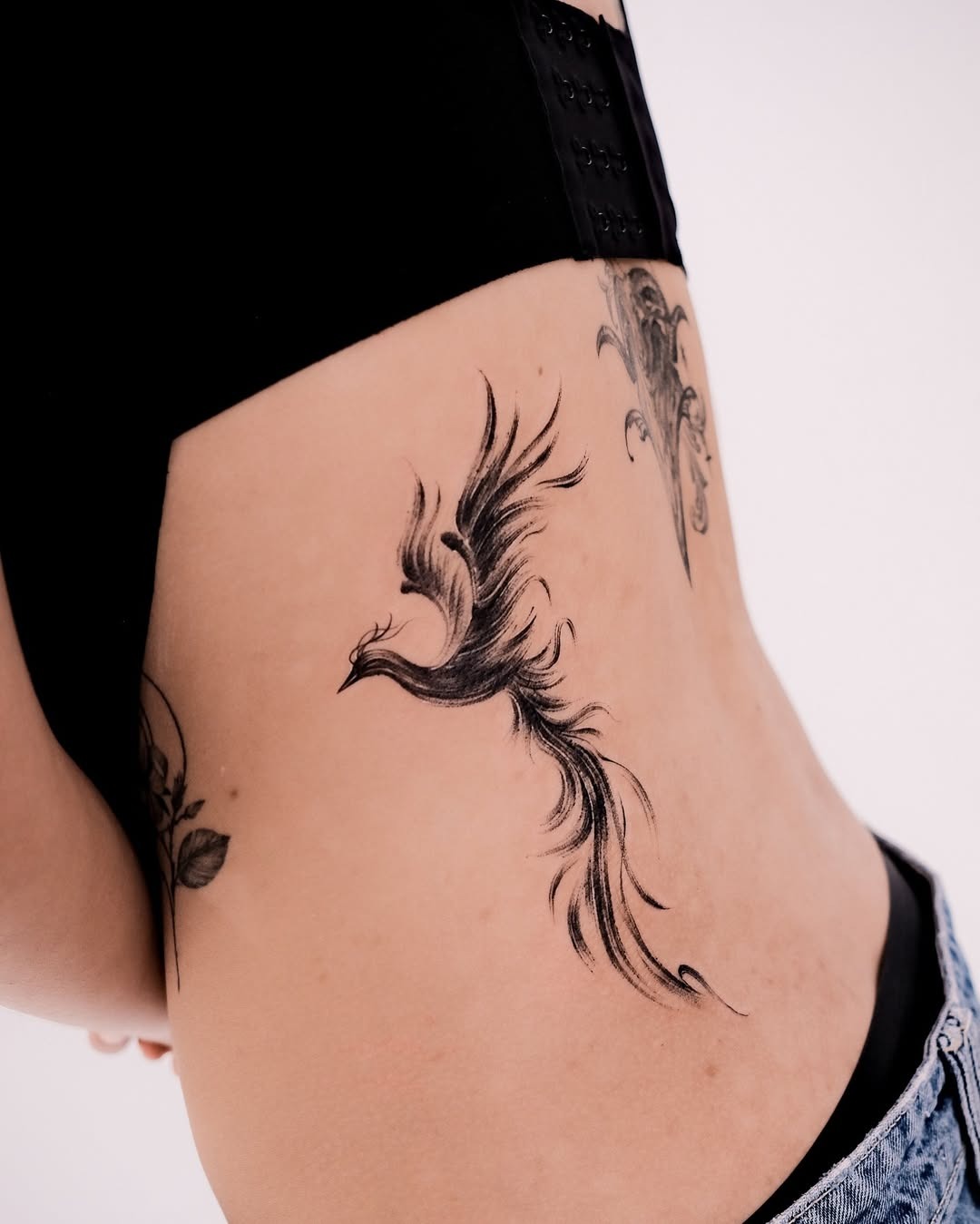 Elegant Phoenix Tattoo Signifying Rebirth Tattoo Design