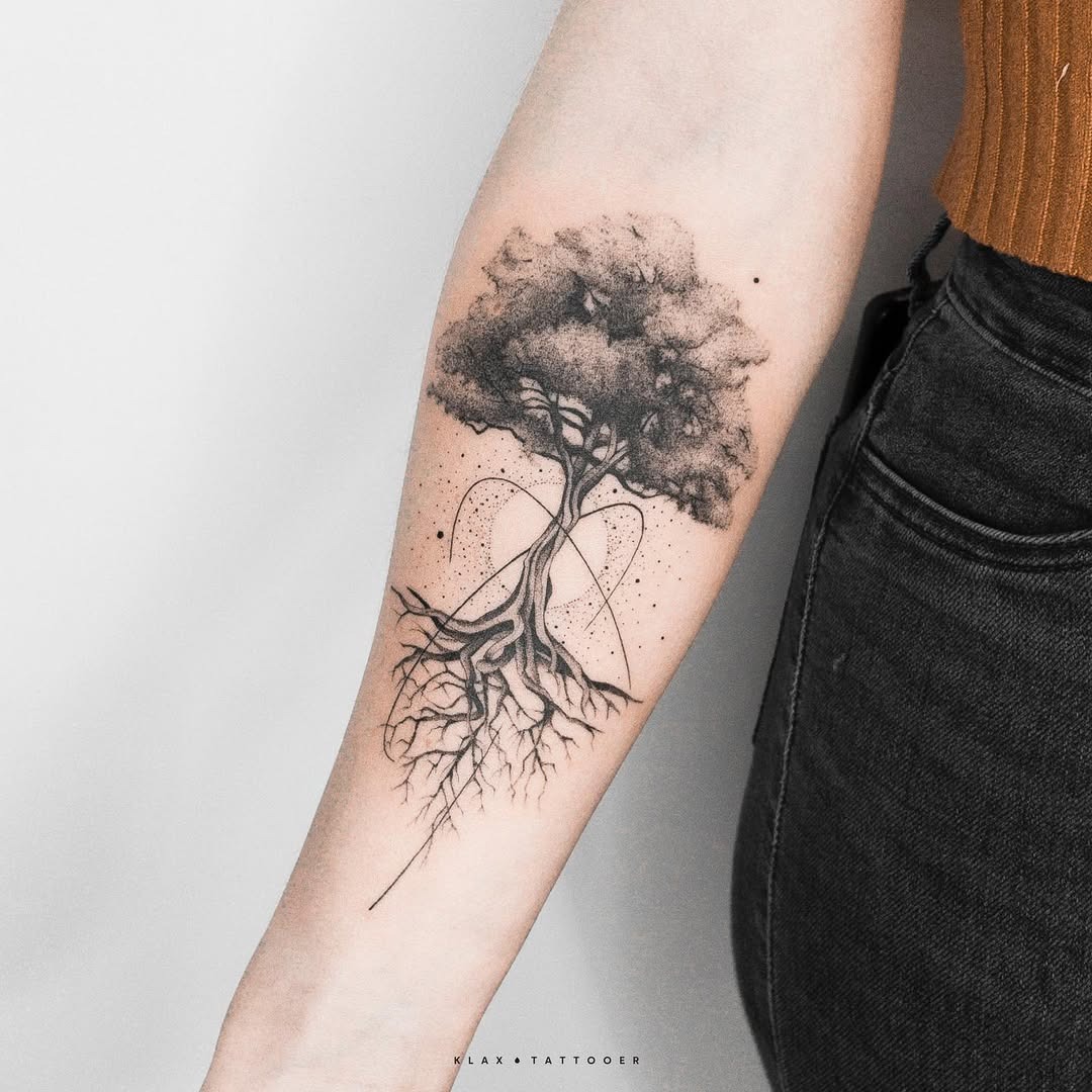 Elegant tree tattoo symbolizing rebirth and connection Tattoo Design