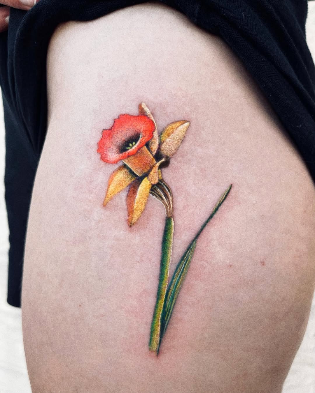 Vibrant Flower Tattoo Symbolizing Rebirth Tattoo Design