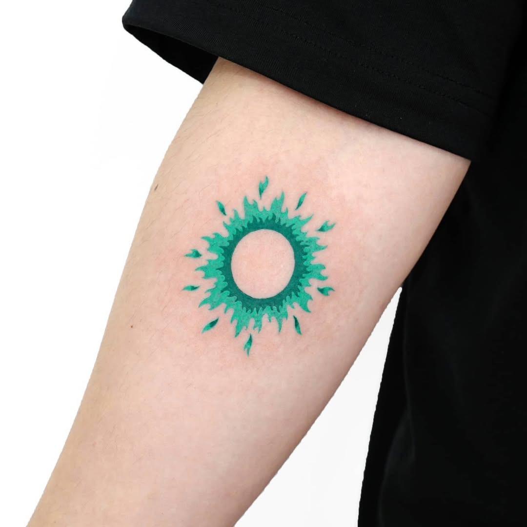 Vibrant sunburst tattoo symbolizing rebirth Tattoo Design
