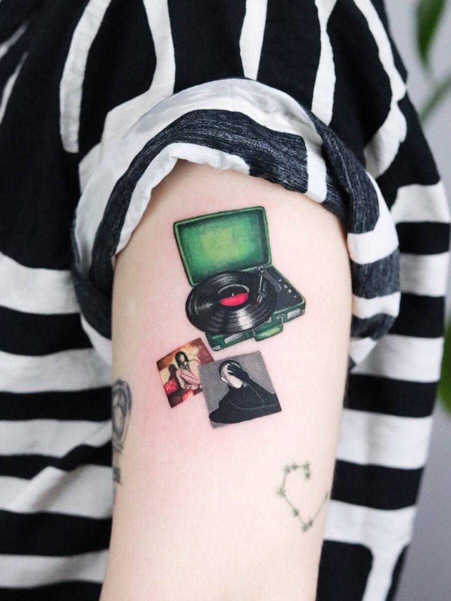 Charming vintage record player tattoo design Tattoo Design