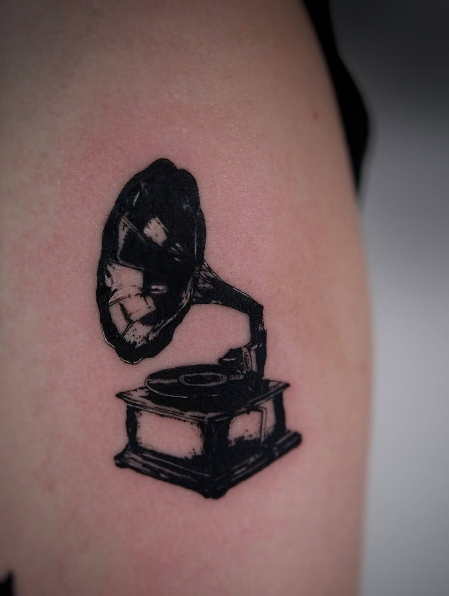 Classic record player tattoo in bold black ink Tattoo Design