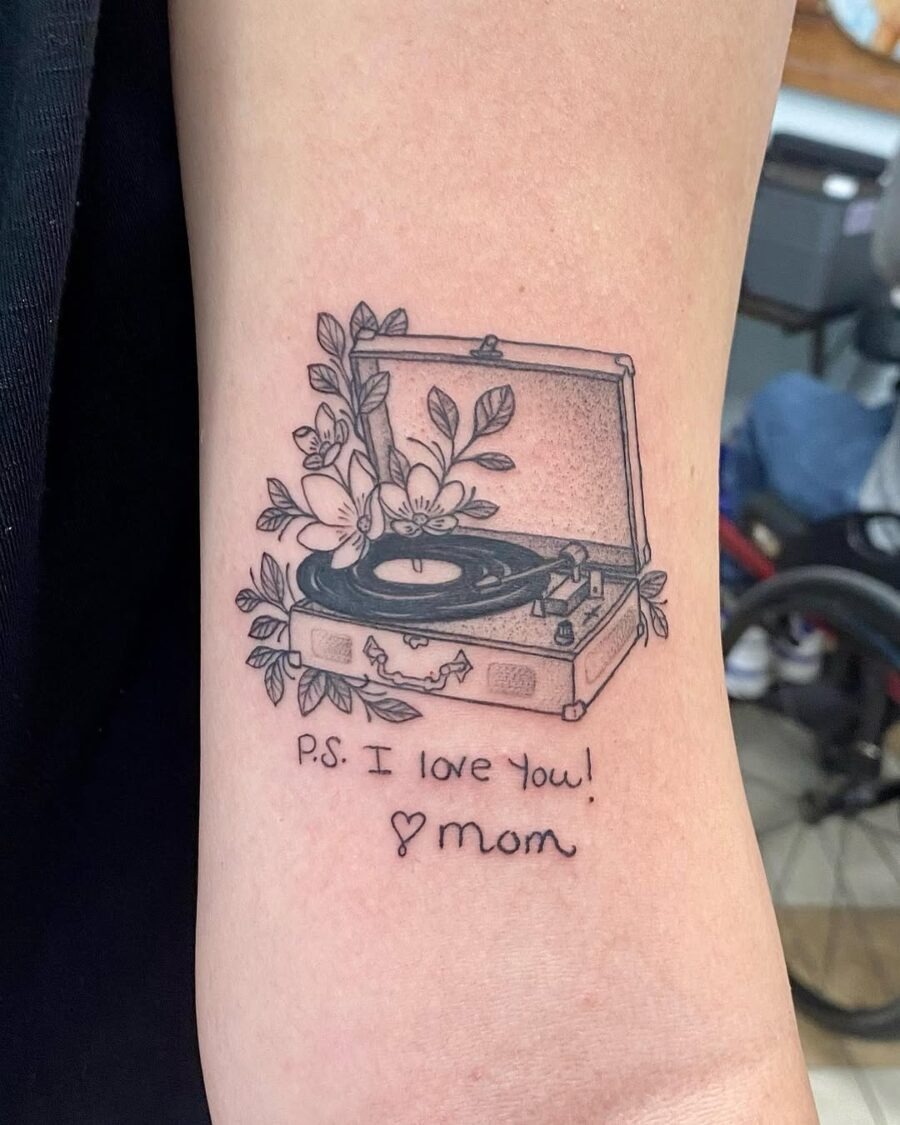 Heartfelt record player tattoo with floral elements Tattoo Design