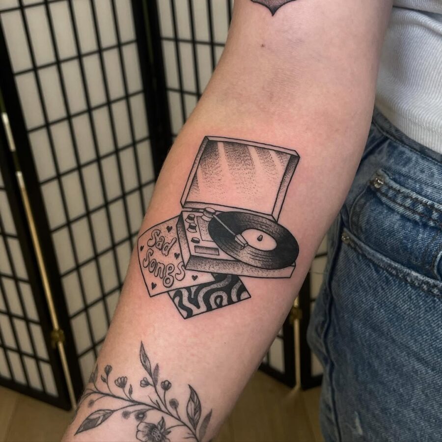 Ink of nostalgia with a sad song vibe Tattoo Design