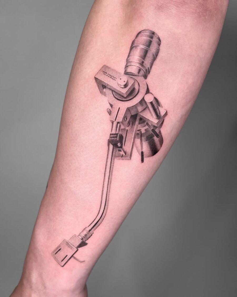 Intricate black and gray record player tattoo Tattoo Design
