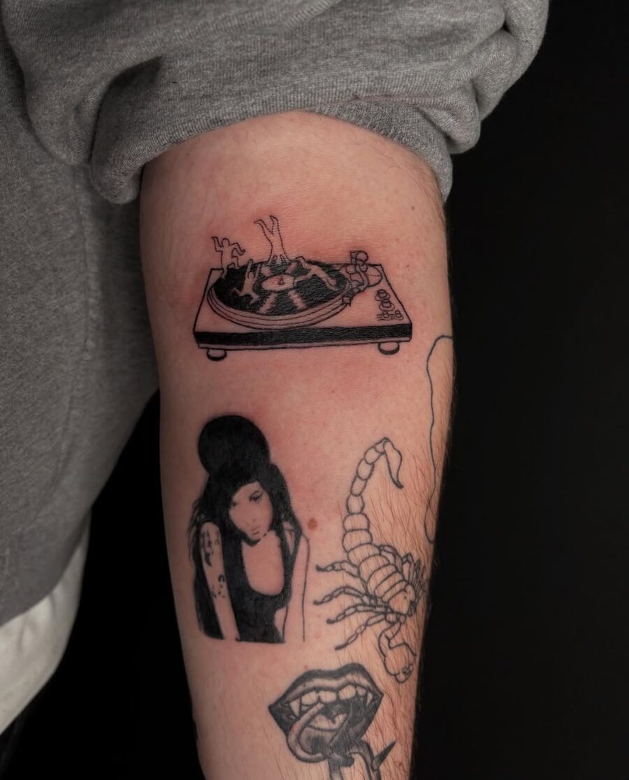 Stylish ink celebrates vinyl culture and artistry Tattoo Design