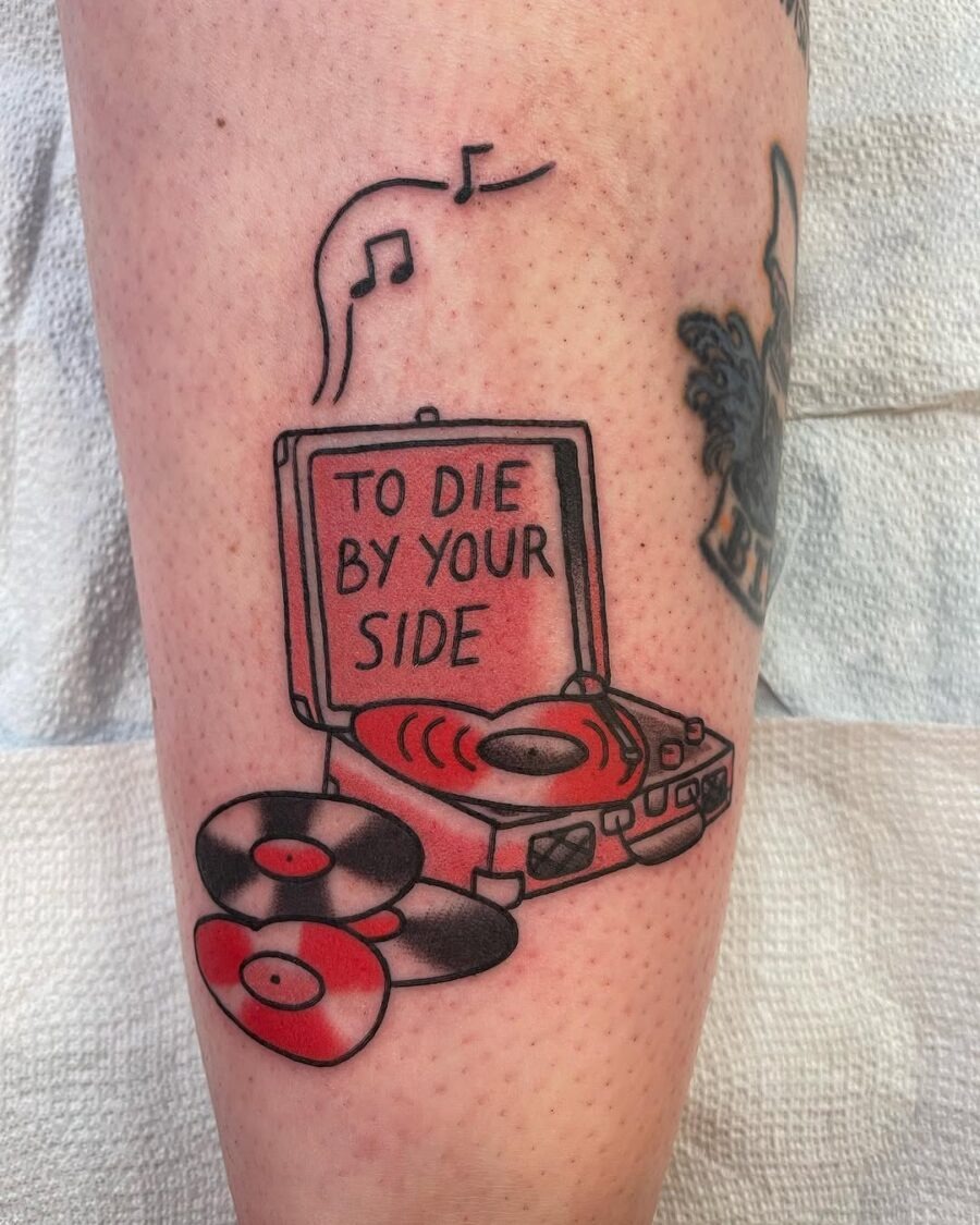 Unique record player tattoo with a heartfelt message Tattoo Design