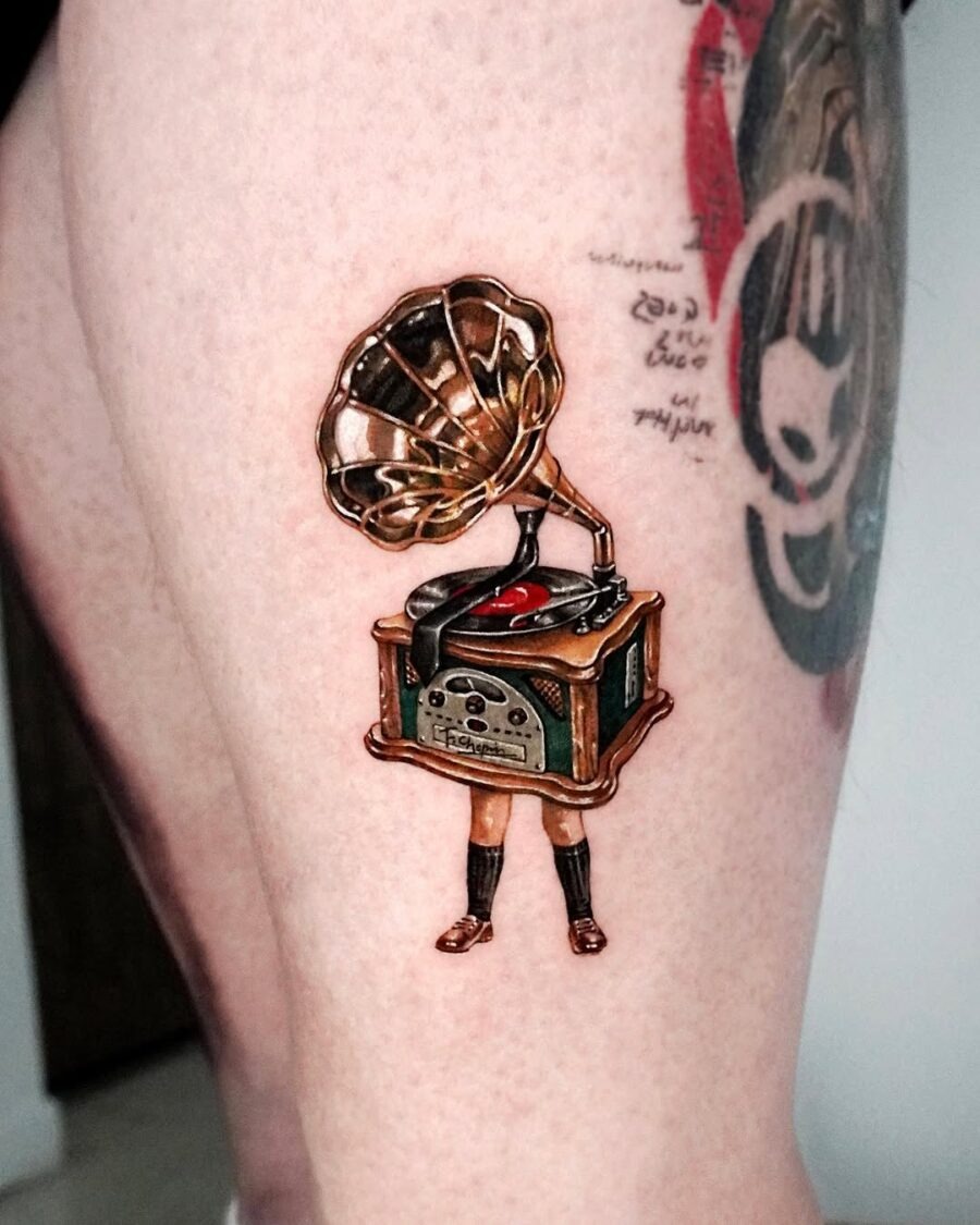 Vintage gramophone tattoo with a creative twist Tattoo Design