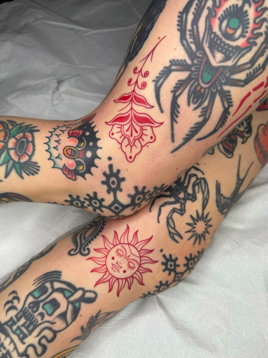 Bold Red Floral Tattoo on Leg Tattoo Design