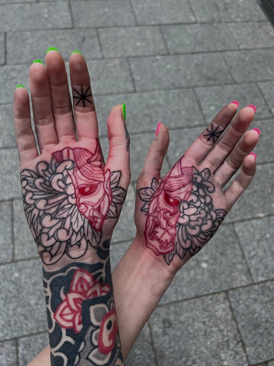 Bold Red Floral Tattoo on Shoulder Tattoo Design