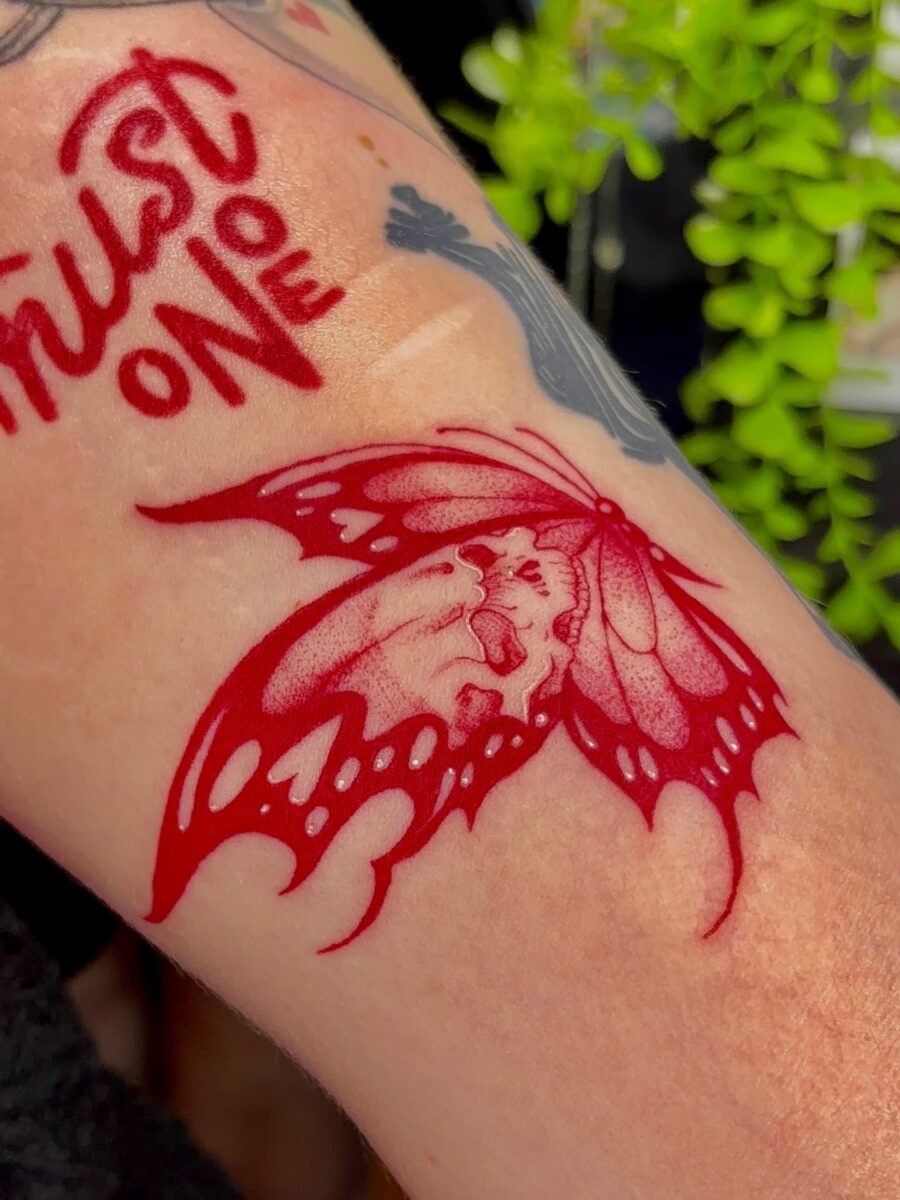 Elegant red ink butterfly tattoo design Tattoo Design