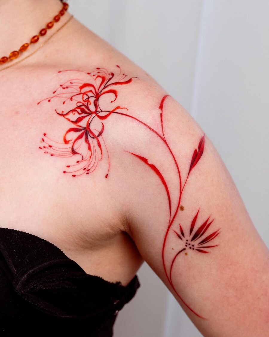 Elegant red ink spider tattoo on back Tattoo Design